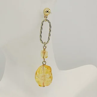 drop pendant earring with amber glass
