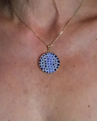 Blue and white murine necklace one inch in gold