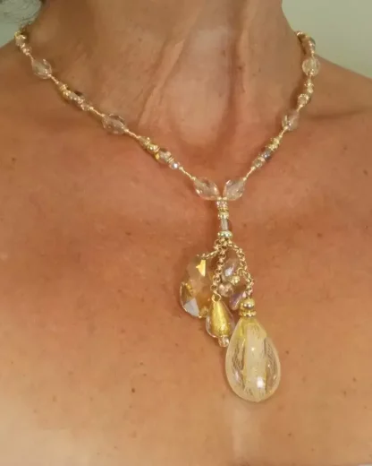 Crystal and gold pendant necklace