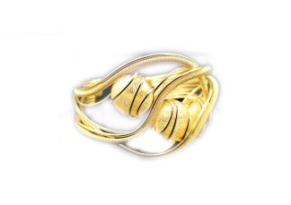 Woven rhodium gold plated metal cuff bracelet with gold murano glass beads
