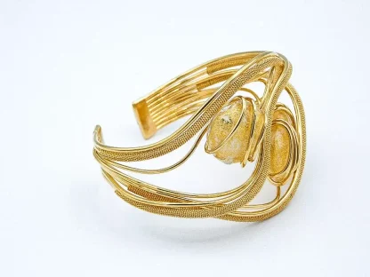 Woven rhodium gold cuff bracelet with gold murano glass beads