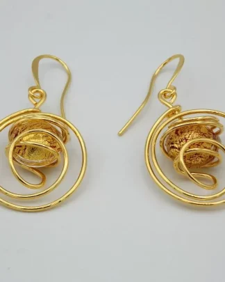Swirling gold rhodium earrings with gold and red Murano bead