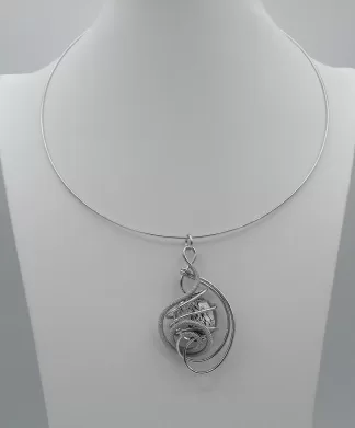 swirling rhodium metal design pendant with a large Murano glass silver bead