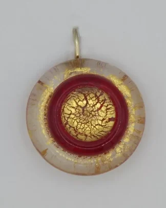 detail of bright gold and red Murano glass earring