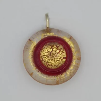 detail of bright gold and red Murano glass earring