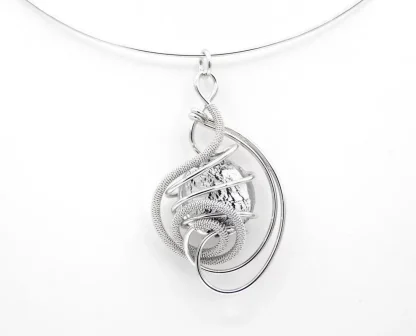 detail swirling silver tone rhodium pendant