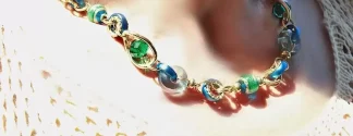 varied detailed Murano glass beads necklace in blues and greens and golds