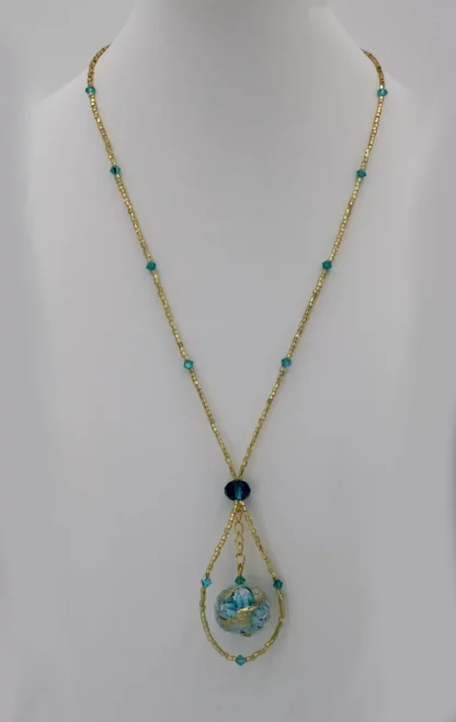 Gold seed bead long Murano glass necklace with blue floral detail