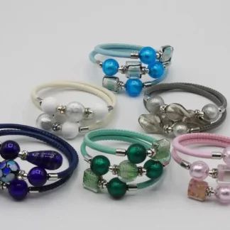 group of triple wrap bracelets in various colors
