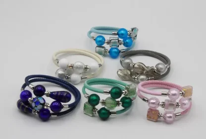 group of triple wrap bracelets in various colors
