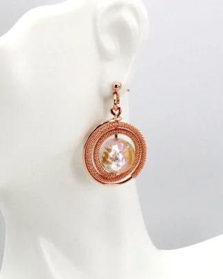 Rose gold circular drop earrings with shiny Murano glass bead at center
