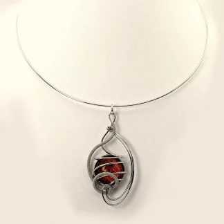 Arabesque shape silver pendant on a collar necklace with a fiery bronze Murano glass bead