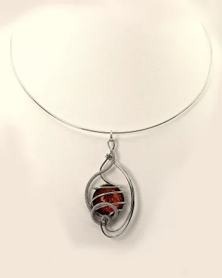 Arabesque shape silver pendant on a collar necklace with a fiery bronze Murano glass bead