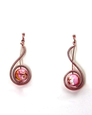 Rose gold tone arabesque shaped long earrings with pinkish Murano glass bead