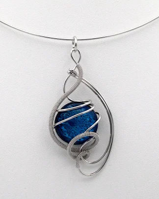 Arabesque silver tone pendant collar necklace wrapped wire with a large blue Murano glass bead