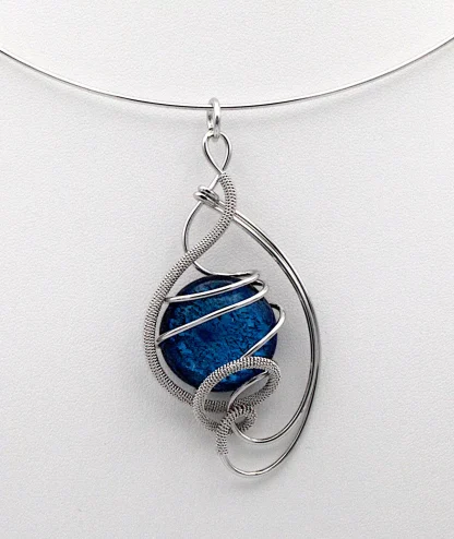 Arabesque silver tone pendant collar necklace wrapped wire with a large blue Murano glass bead