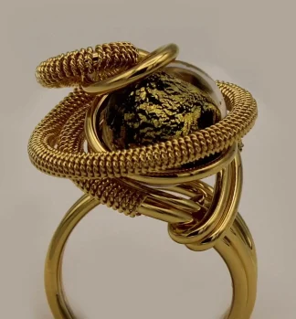 golden swirls mound ring with wire wrapped detail and black and gold Murano glass bead