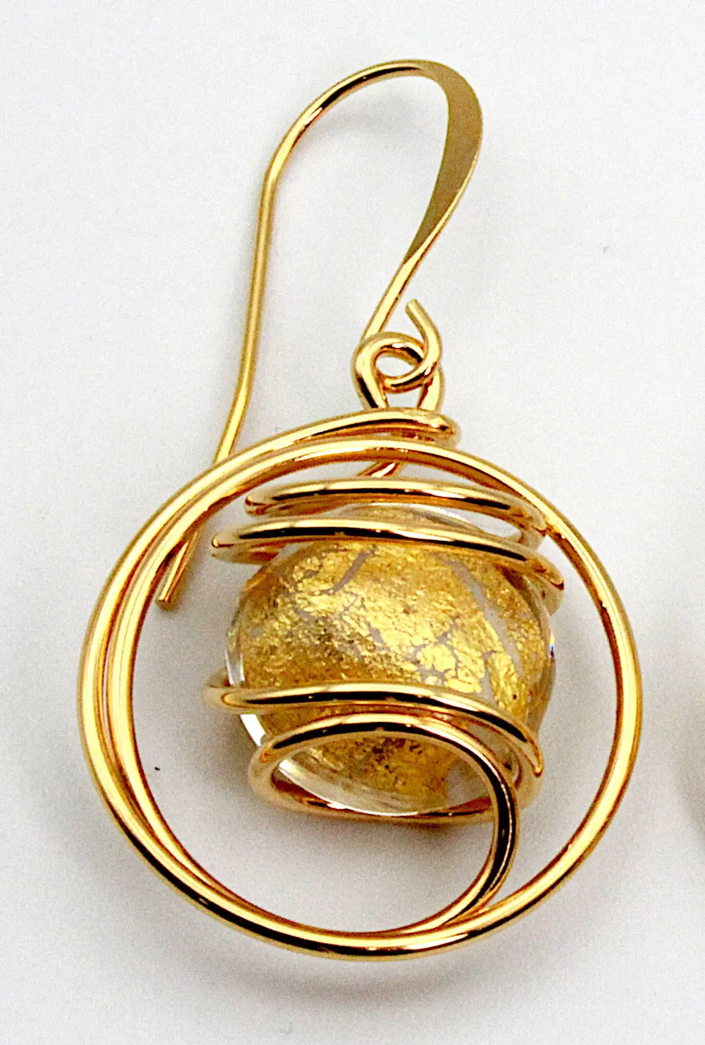 swirling gold drop earrings-gold-closeup