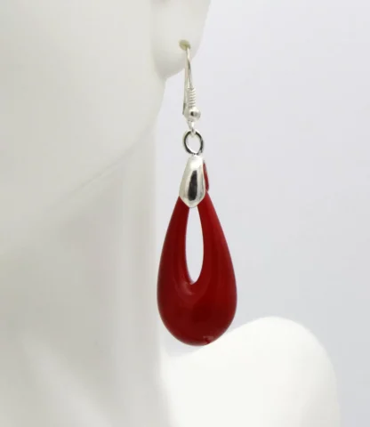 close up of large red Murano glass teardrop earring on a French wire