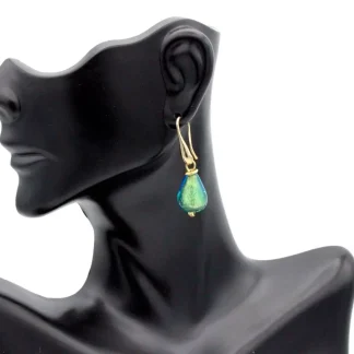 Aquamarine Murano glass teardrop earring 1 1/2 inch teardrop shape in gold tone wires on model