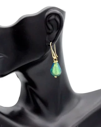 Aquamarine Murano glass teardrop earring 1 1/2 inch teardrop shape in gold tone wires on model