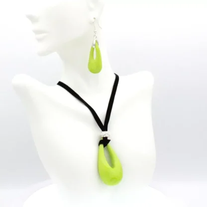 Chartreuse color Murano glass drop pendant with touch of bling on a black velvet cord and matching earrings