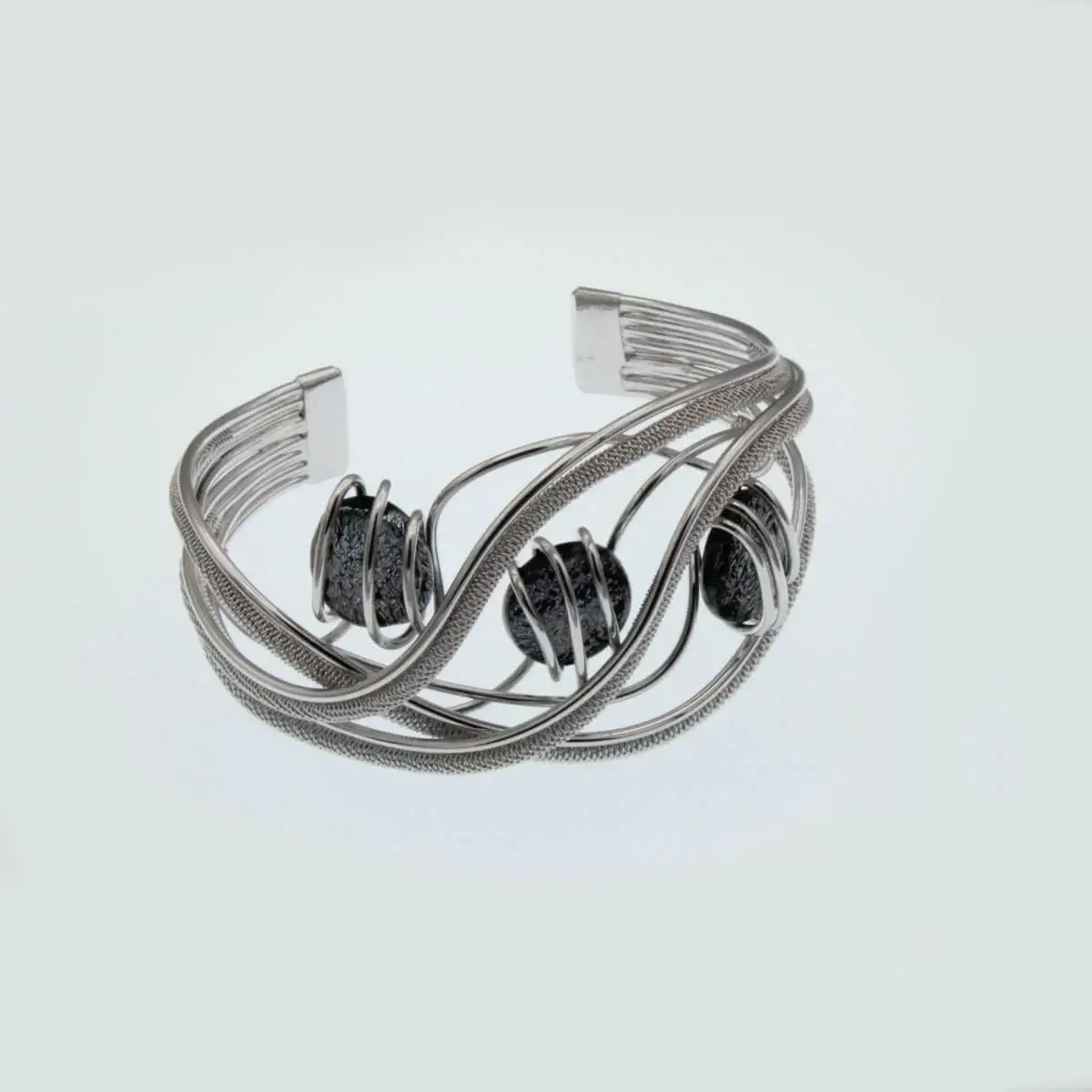 Hand Wrapped rhodium silver wire large cuff bracelet in wave shape with three Murano glass grey beads
