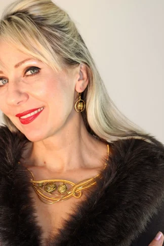 Golden hand wrapped collar necklace bracelet and necklace with three Murano glass black and gold beads