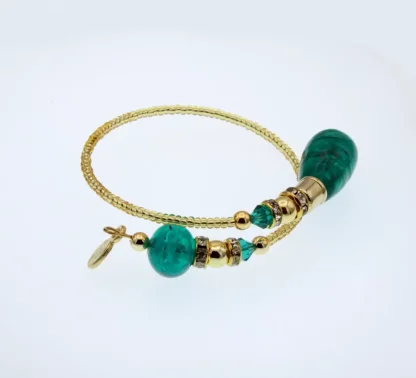 Murano glass wrap bracelet with gold glass beads and large green beads at its ends, mini bling and gold details