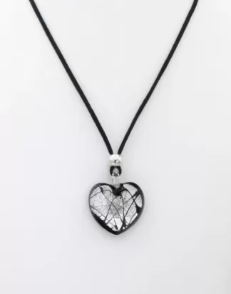 Heart shaped Murano glass silver infusion necklace on a bed of black glass on a 16 inch silk cord