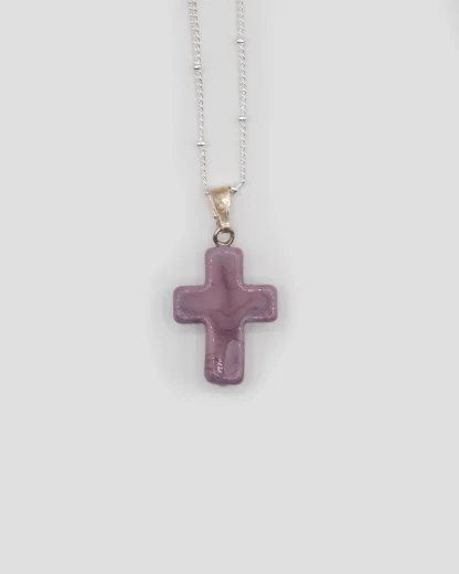 Small 3/4 inch purple Murano glass cross on a silver plated satellite chain