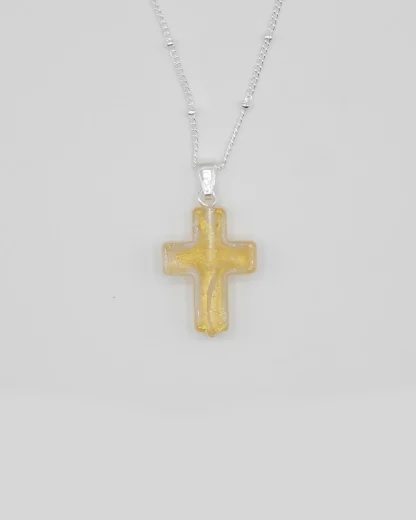 Small 3/4 inch gold Murano glass cross on a silver plated satellite chain