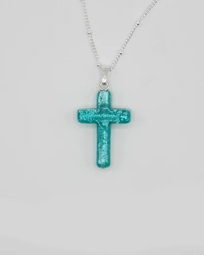 Medium 1 inch aqua (teal) Murano glass cross on a silver plated satellite chain