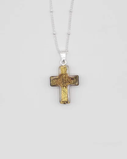 Small 3/4 inch antique gold Murano glass cross with gold infusion on a silver plated satellite chain