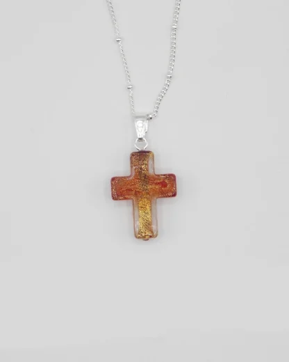 Small 3/4 inch rose and and gold Murano glass cross infused with gold on a silver plated satellite chain