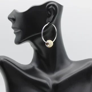 Sterling silver hoop earring with gold and silver Pandora style bead