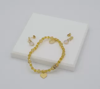 Amber Murano glass stretch bracelet with matching delicate drop earrings on post with gold details