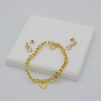 Amber Murano glass stretch bracelet with matching delicate drop earrings on post with gold details