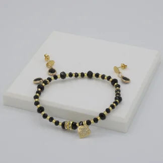 Dramatic delicate ebony Murano glass stretch bracelet with matching delicate drop earrings on post with gold details