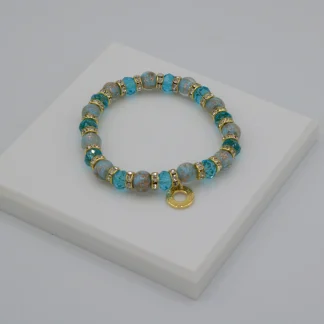 Light blue tones Murano glass bead stretch bracelet with bling and gold charm detail