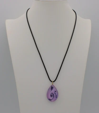 Murano glass purple scroll teardrop pendant on a black cotton cord