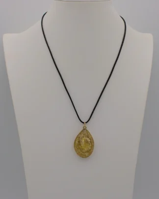Golden tones swirls of Murano glass gold infused pendant on a black cotton cord