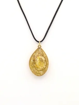 Golden Murano glass pendant with copper swirls, teardrop shape on cord