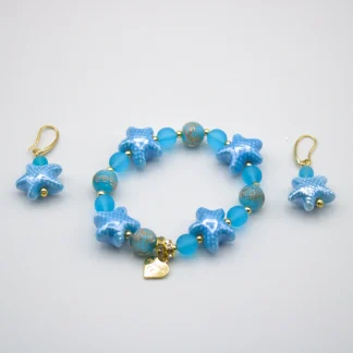 Blue tones Murano glass stretch bracelet with starfish and other blue tone beads with copper infusion