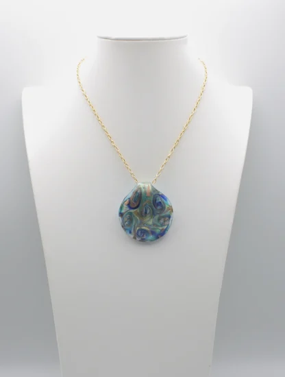 blues and gold Murano glass swirls on a gold plated chain large round pendant with gold and copper infusion