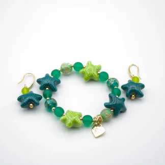 Green tones Murano glass stretch bracelet with starfish and other green tone beads with copper infusion