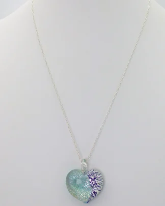 Murano Blue Silver Swirl heart pendant one inch by one inch, silver infusion on a bed of two tones of blue on an 18 silver chain