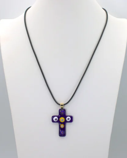 Cobalt Murano cross necklace with colorful millefiori decoration on a cotton cord