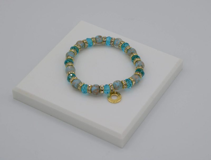 light turquoise Murano glass beads stretch bracelet with mini bling and gold details 