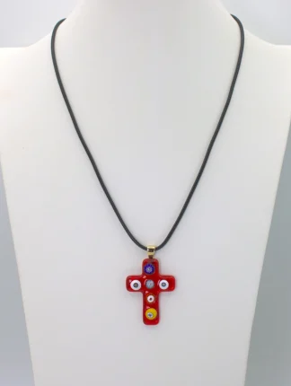 Red Murano cross pendant with colorful millefiori decoration on a cotton cord